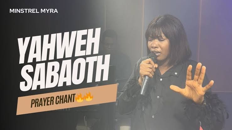 A woman singing into a microphone